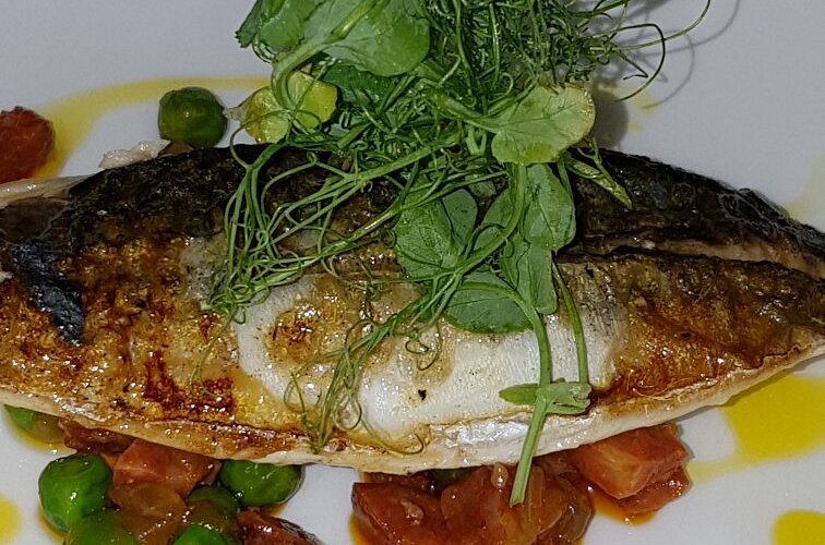 A plated fish dish photographed at Kitchen Lurgan